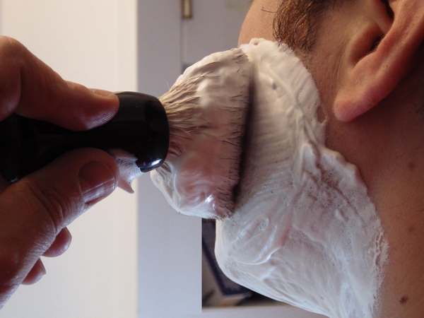 Applying shaving soap lather